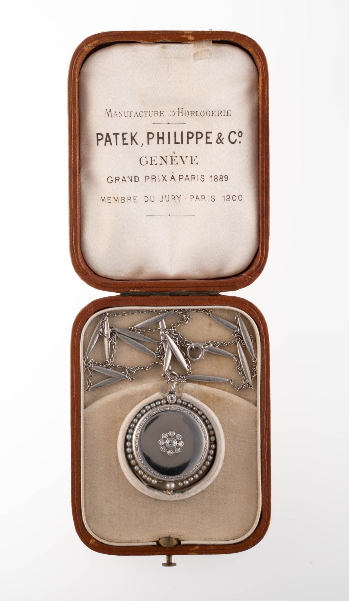 PATEK PHILIPPE PLATINUM, DIAMOND, AND NATURAL PEARL LADIES PENDANT WATCH WITH MATCHING CHAIN AND ORIGINAL BOX