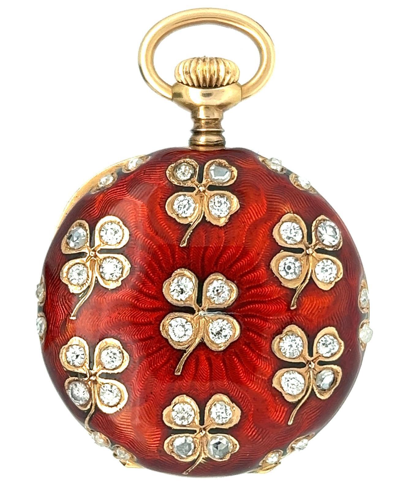 SWISS RED GUILLOCHE ENAMEL AND ROSE CUT DIAMOND PENDANT WATCH, CIRCA 1895