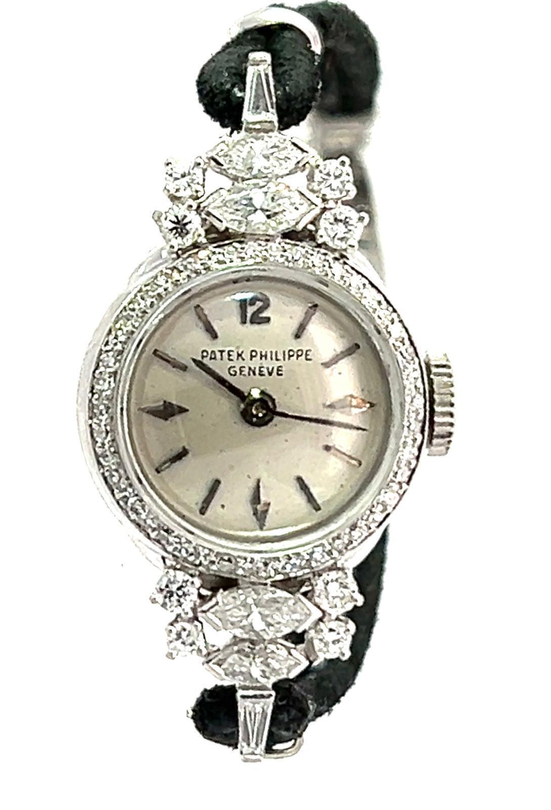 PATEK PHILIPPE PLATINUM AND DIAMOND LADIES COCKTAIL WRISTWATCH, CIRCA 1955