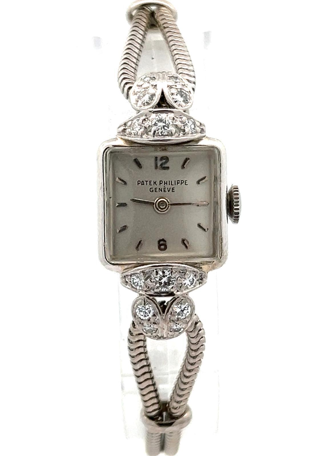 PATEK PHILIPPE 18K WHITE GOLD AND DIAMOND COCKTAIL WATCH WITH ARCHIVE, CIRCA 1955