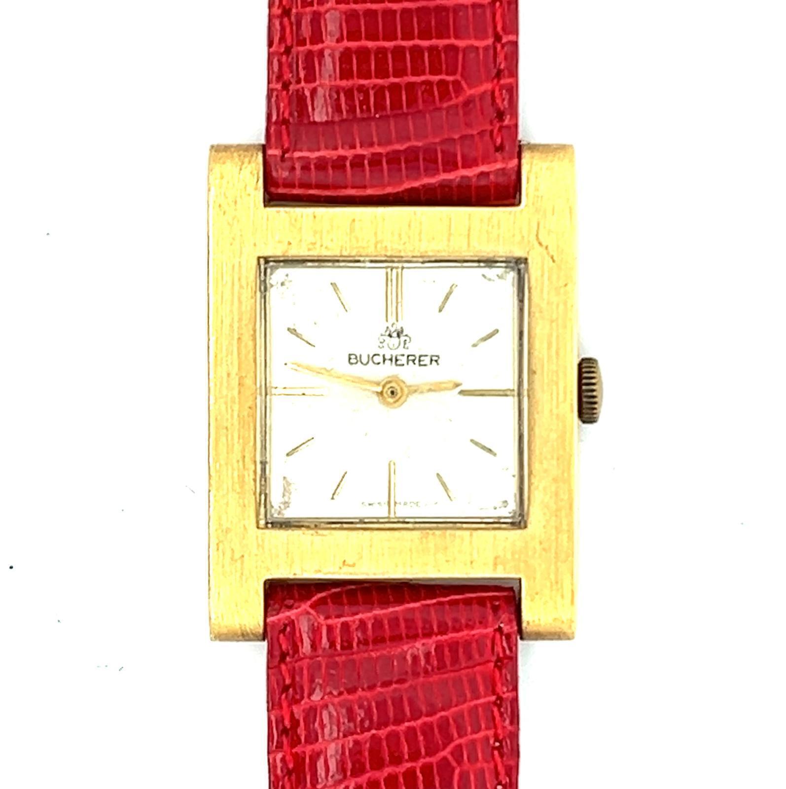 BUCHERER 18K YELLOW GOLD RECTANGULAR WRISTWATCH, CIRCA 1960’S