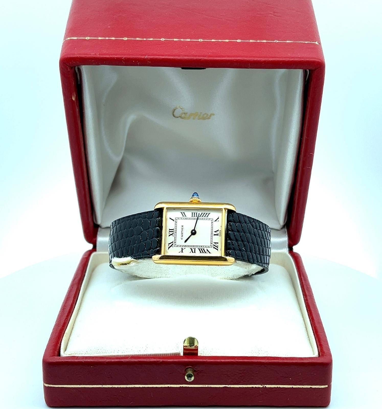 CARTIER PARIS 18K GOLD AUTOMATIC TANK WATCH WITH ORIGINAL CARTIER 18K GOLD DEPLOYMENT BUCKLE, CIRCA 1970