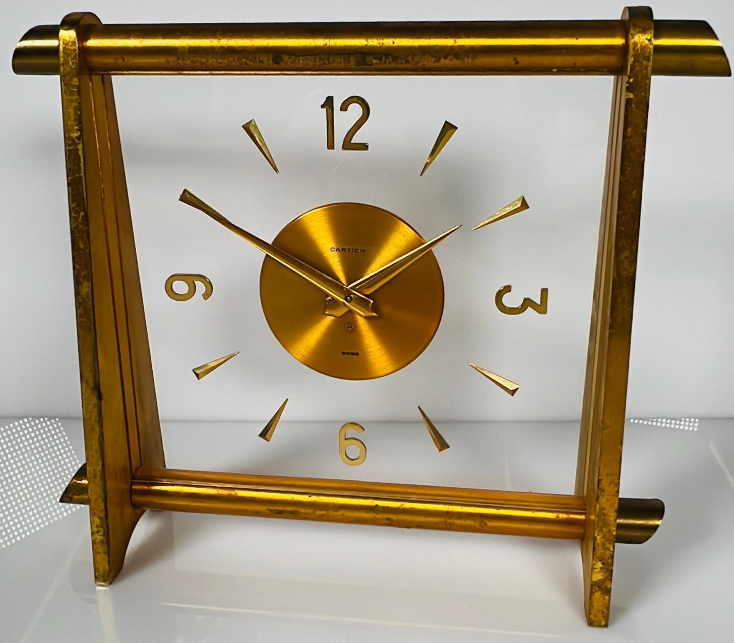 CARTIER GILT BRASS 8 DAY TABLE CLOCK, CIRCA 1950