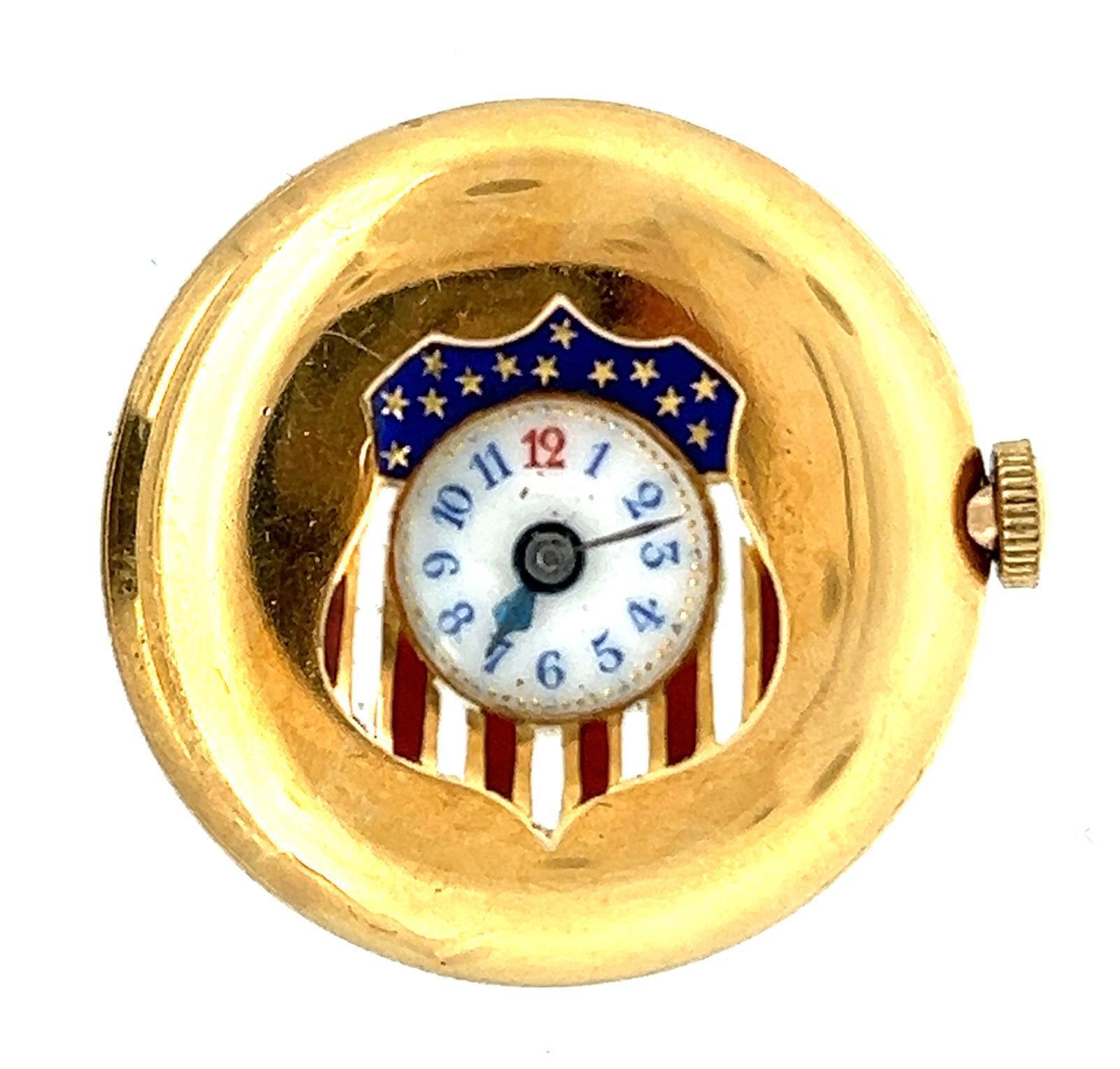 UNUSUAL AMERICAN FLAG SHIELD LAPEL WATCH, LONGINES 18K GOLD AND ENAMEL, CIRCA 1920