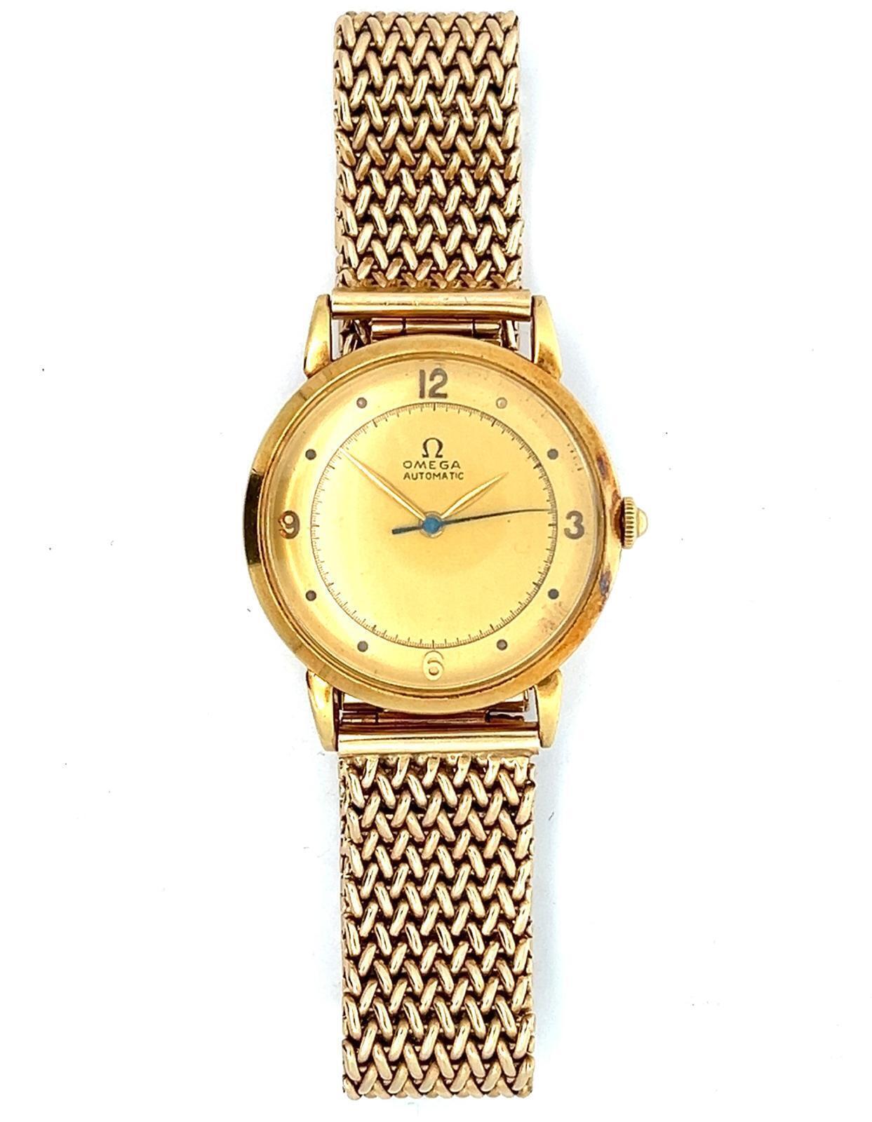 OMEGA 18K GOLD AUTOMATIC WRISTWATCH WITH GOLD BRACELET, CIRCA 1944